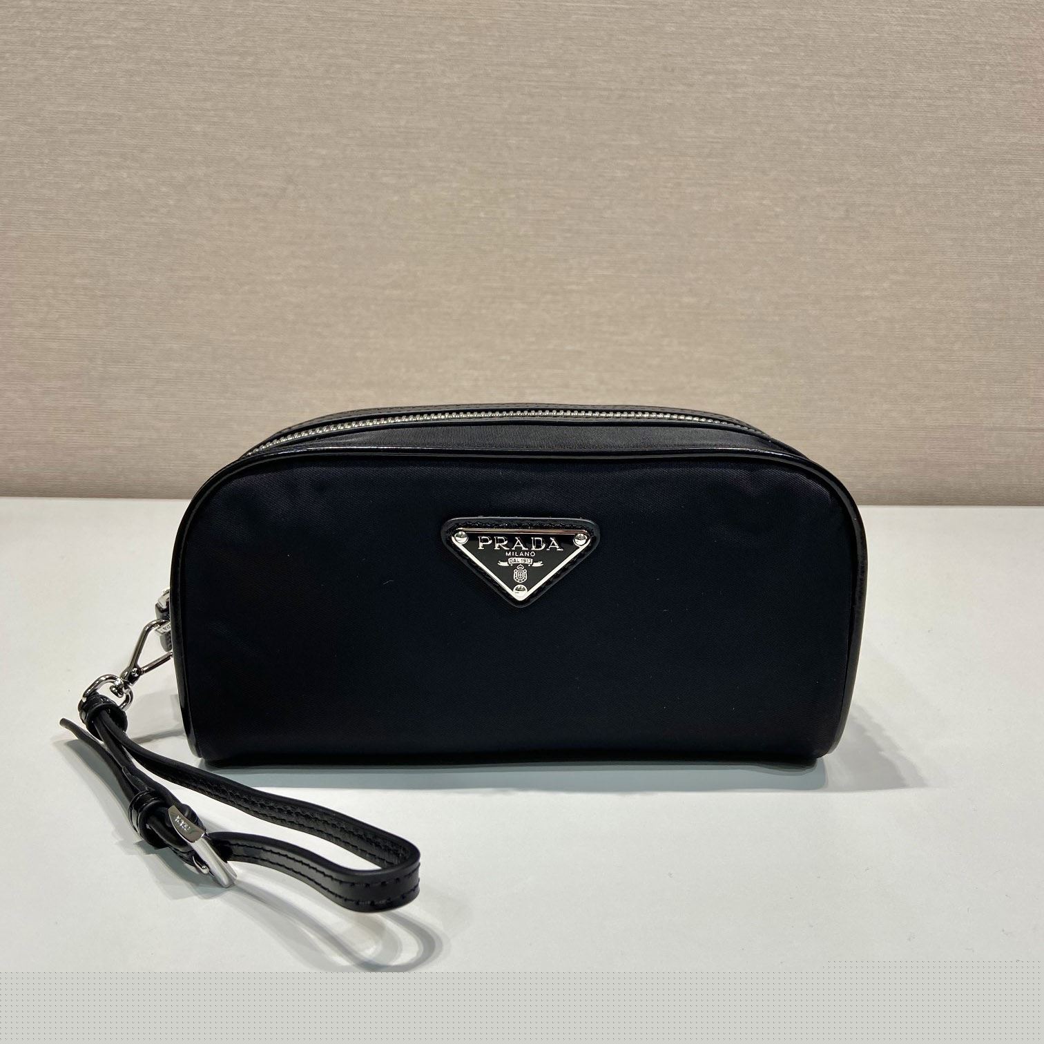 Pra*a clutch bags